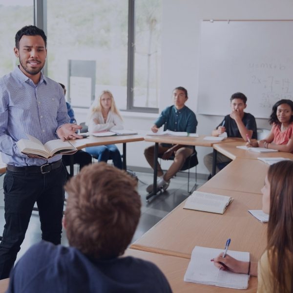 male teacher teaching an English class