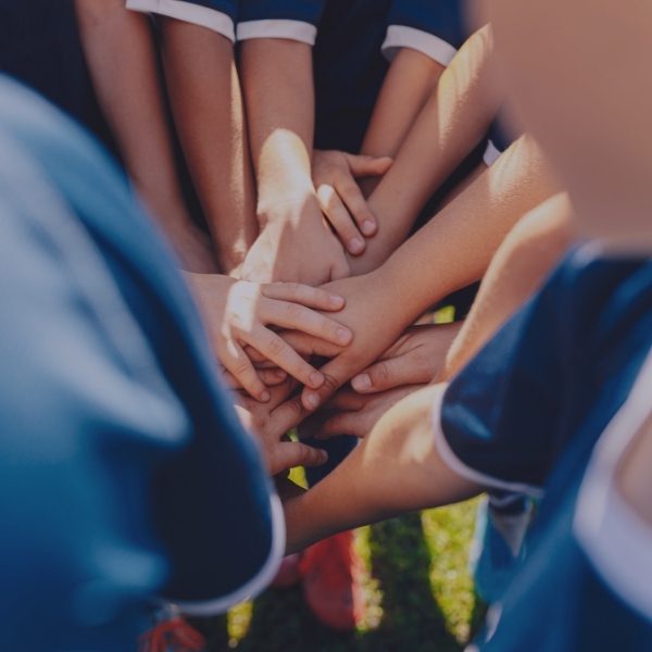 close up of team huddle