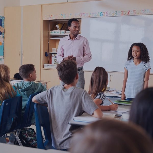 girl doing presentation in front of class