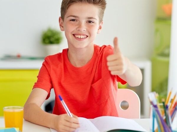 Boy giving a thumbs up