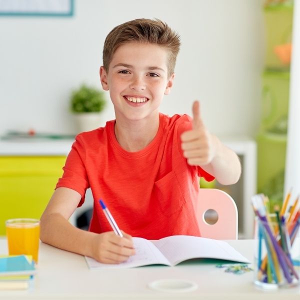 Boy giving a thumbs up